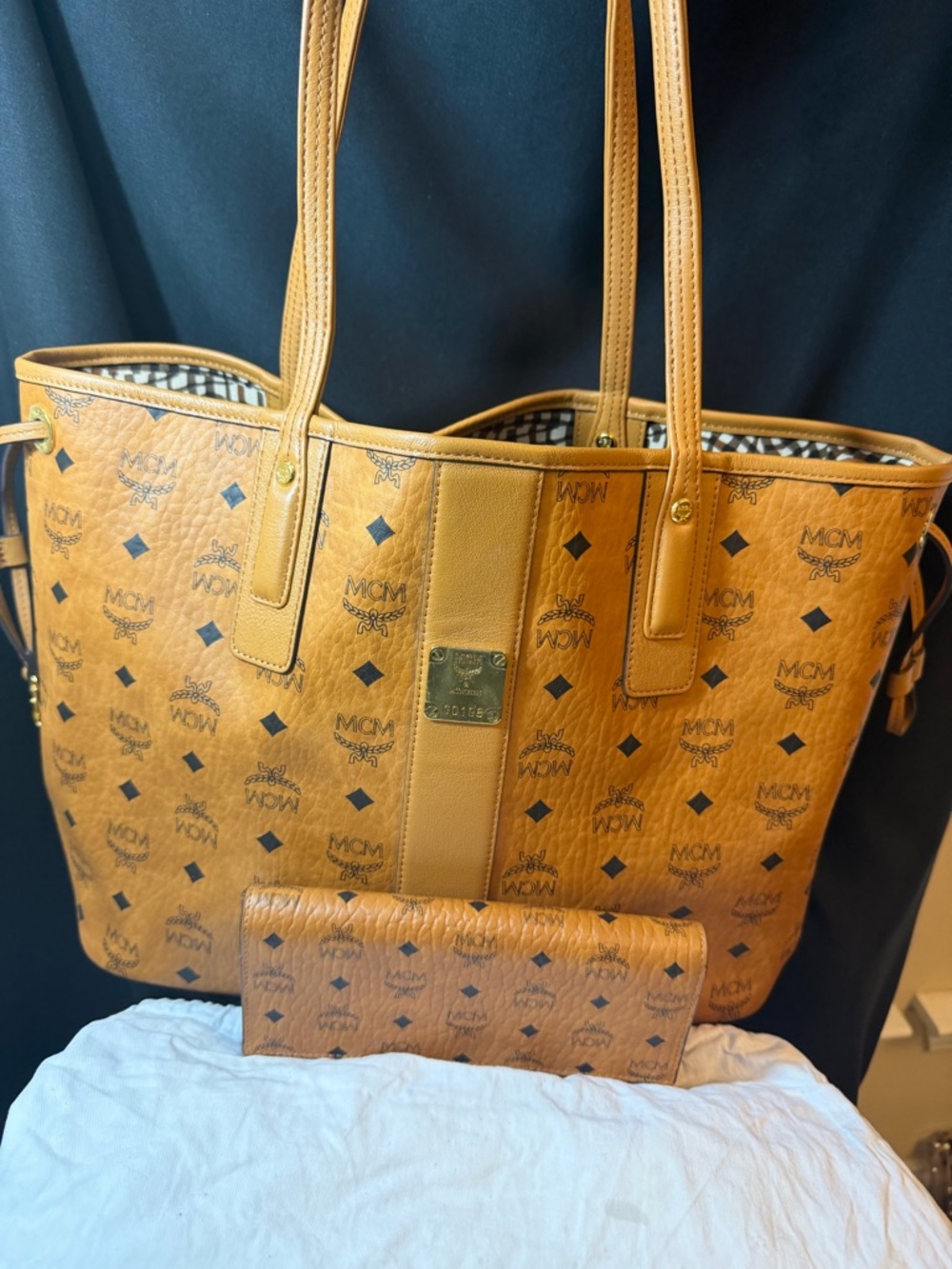 MCM Cognac medium Liz Tote with Matching Wallet. In MCM dust bag. Reversible.
